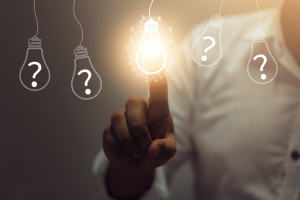 Businessman pressing lightbulb mark that lights up