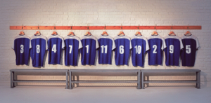 football team shirts on locker room wall with bench